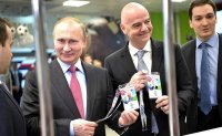 Паспорт болельщика вручен  Президенту РФ Владимиру Путину